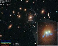 Hubble Spots Spiral Bridge of Young Stars Linking Two Ancient Galaxies
