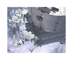 Crew Stows Spacesuits, Completes Robotics Checkout