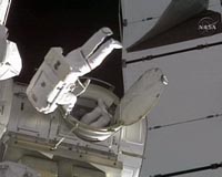 Astronauts complete first Discovery mission spacewalk