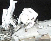 Astronauts Complete First Spacewalk
