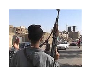 Iraq forces arrest Sunni MP, kill brother and 5 guards