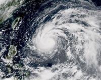 Hundreds of flights grounded as typhoon strikes near Tokyo