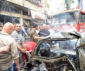 Car bomb kills 50 in Syria as air strikes pound rebels