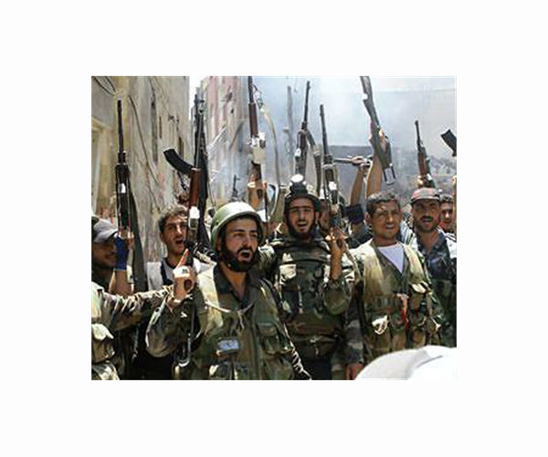 Syria clashes kill 18 pro-regime fighters, jihadists: monitor