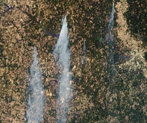 Scorched Earth: The Past, Present and Future of Human Influences on Wildfires