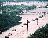 UK police raid Tiananmen survivor's home over Xi protest