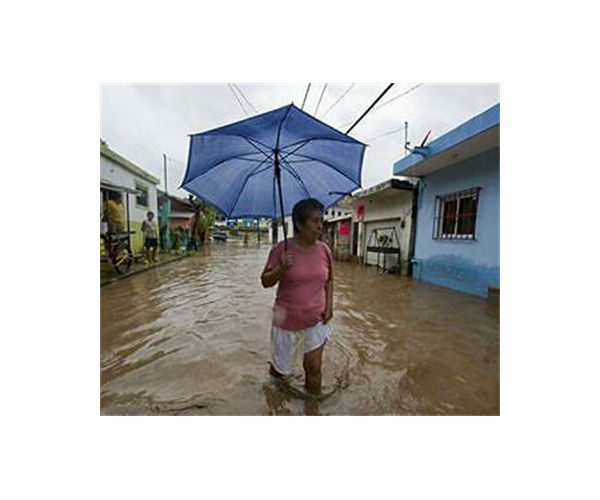 Rain and dam discharge cause flooding in southern Mexico