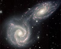 Siamese Twin Galaxies In A Gravitational Embrace