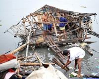 Typhoon-shattered Philippines slowly on mend