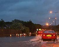 Southern England mops up, as storm alert eases