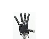 This 5-fingered robot hand learns to get a grip on its own