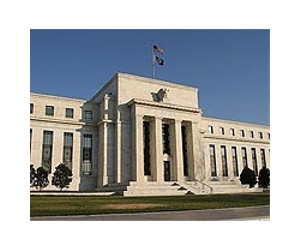 Fed chairman signals possible QE3