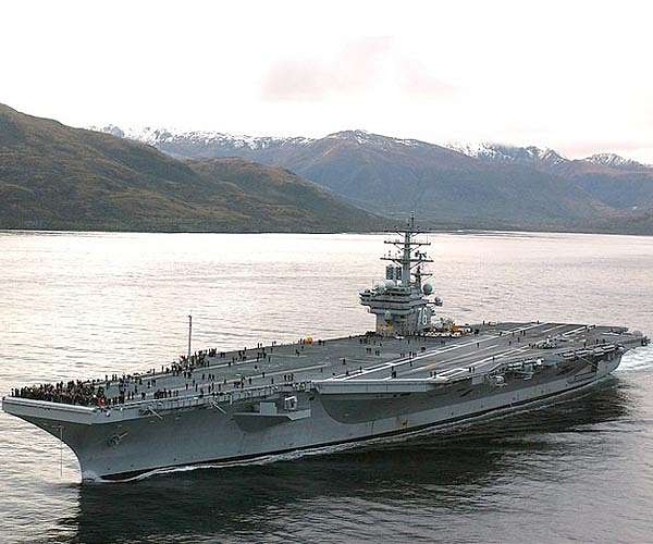 Vice Adm. Bill Merz visits USS Ronald Reagan while at sea