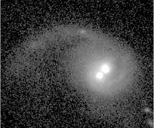 Astronomers Discover Waltzing Black Holes