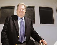 Under-pressure whale chief seeks compromise