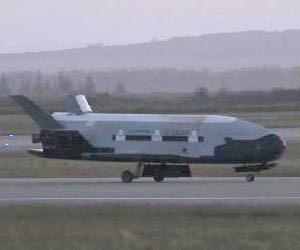 Pilotless US space plane lands after 469 days in orbit