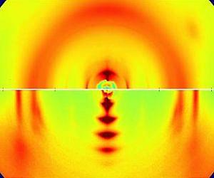Disorder can improve the performance of plastic solar cells