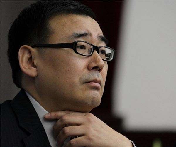 Yang Jun: dissident Chinese-Australian writer handed suspended death sentence