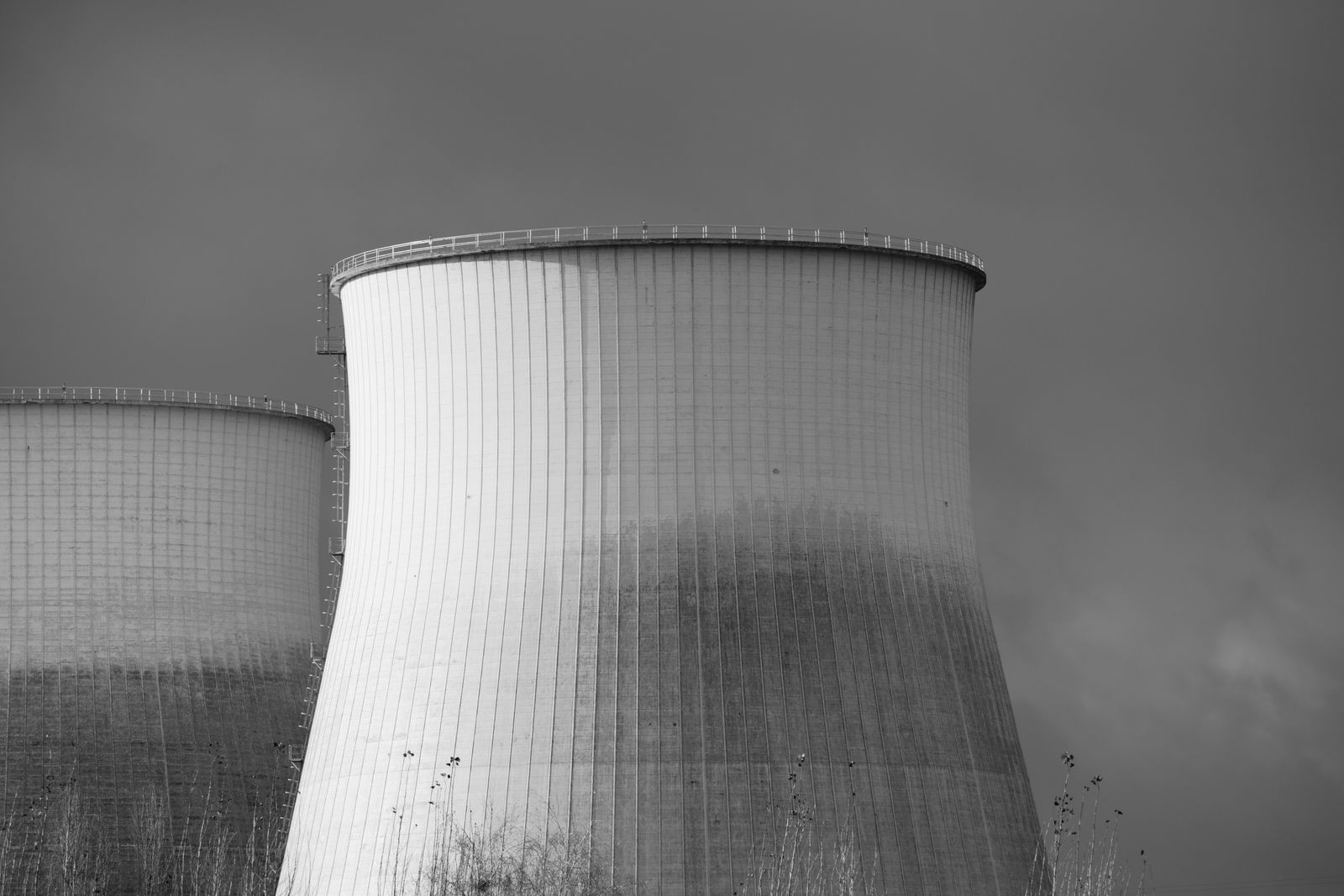 In December 1942, beneath the abandoned squash court under Chicago's Stagg Field, Enrico Fermi's team pulled the cadmium control rods from a stack of graphite bricks and uranium slugs and watched the world's first self-sustaining nuclear chain reaction hold steady for 28 minutes before Fermi ordered the emergency rod called zip dropped back in and the pile went silent